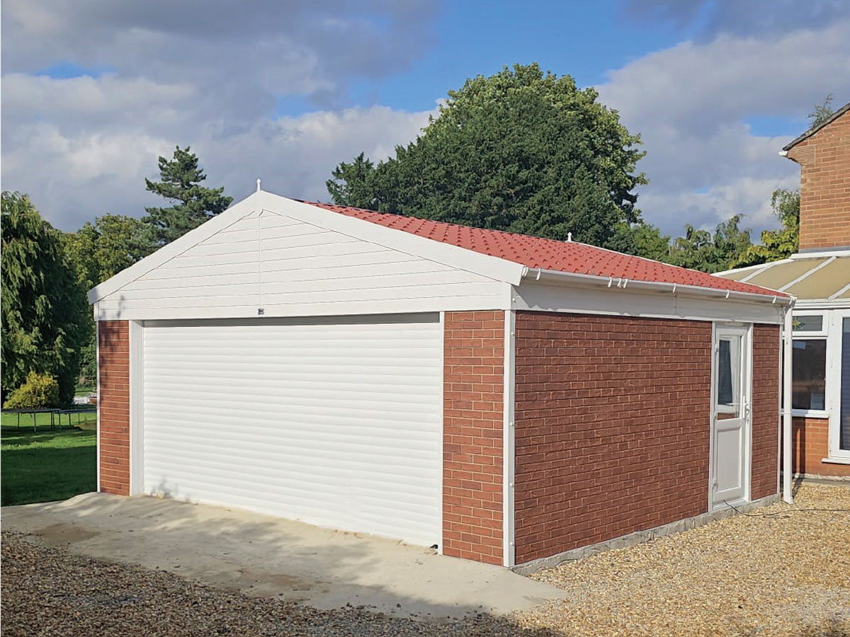 rusticred-clad red clad garage